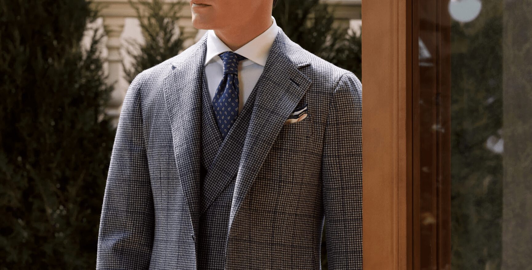 Three-piece suit with notch lapel — front view.