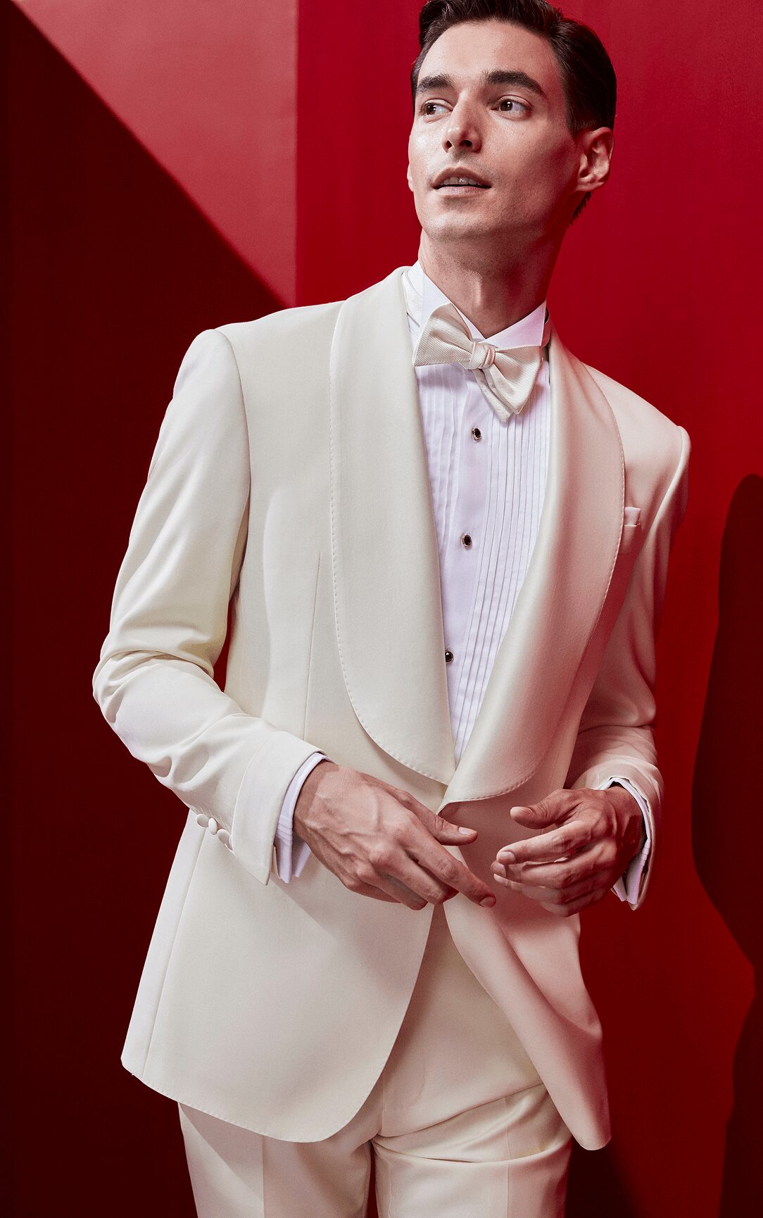 White one-button tuxedo with silk shawl collar — front view.