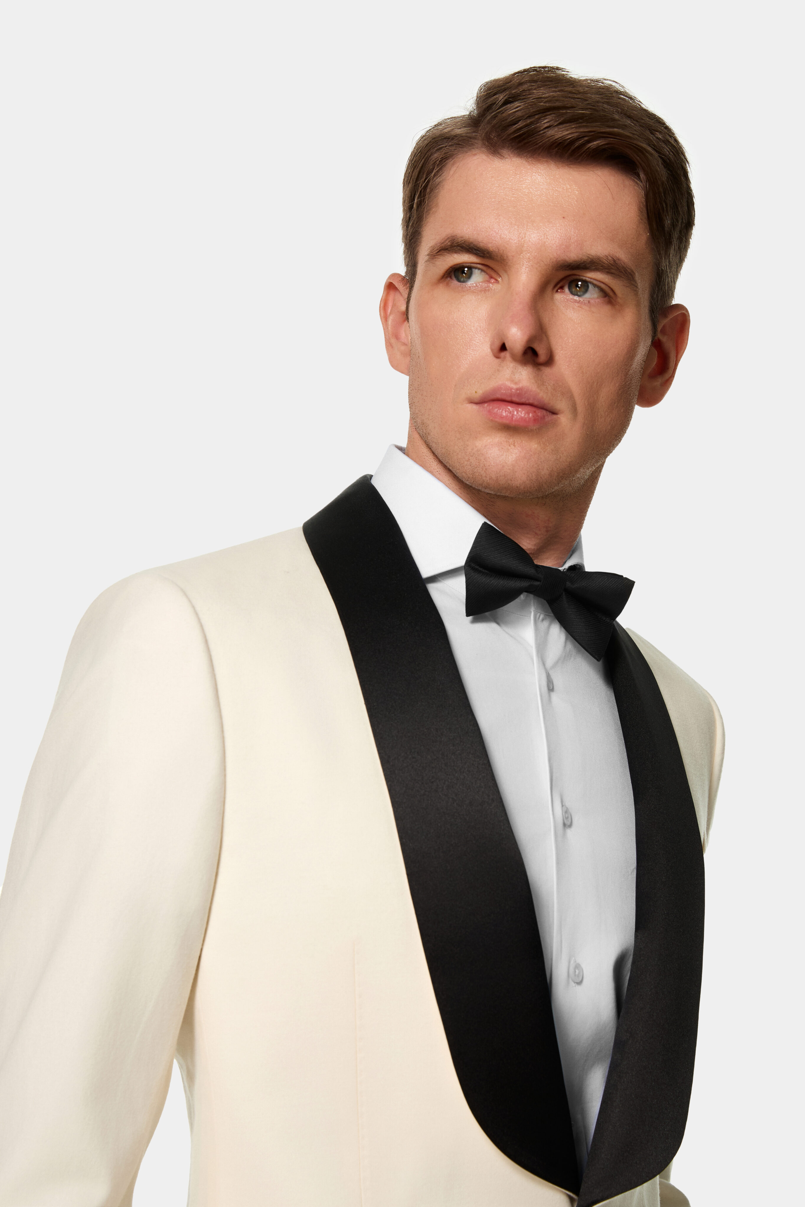 Black silk shawl collar detail on ivory dinner jacket.