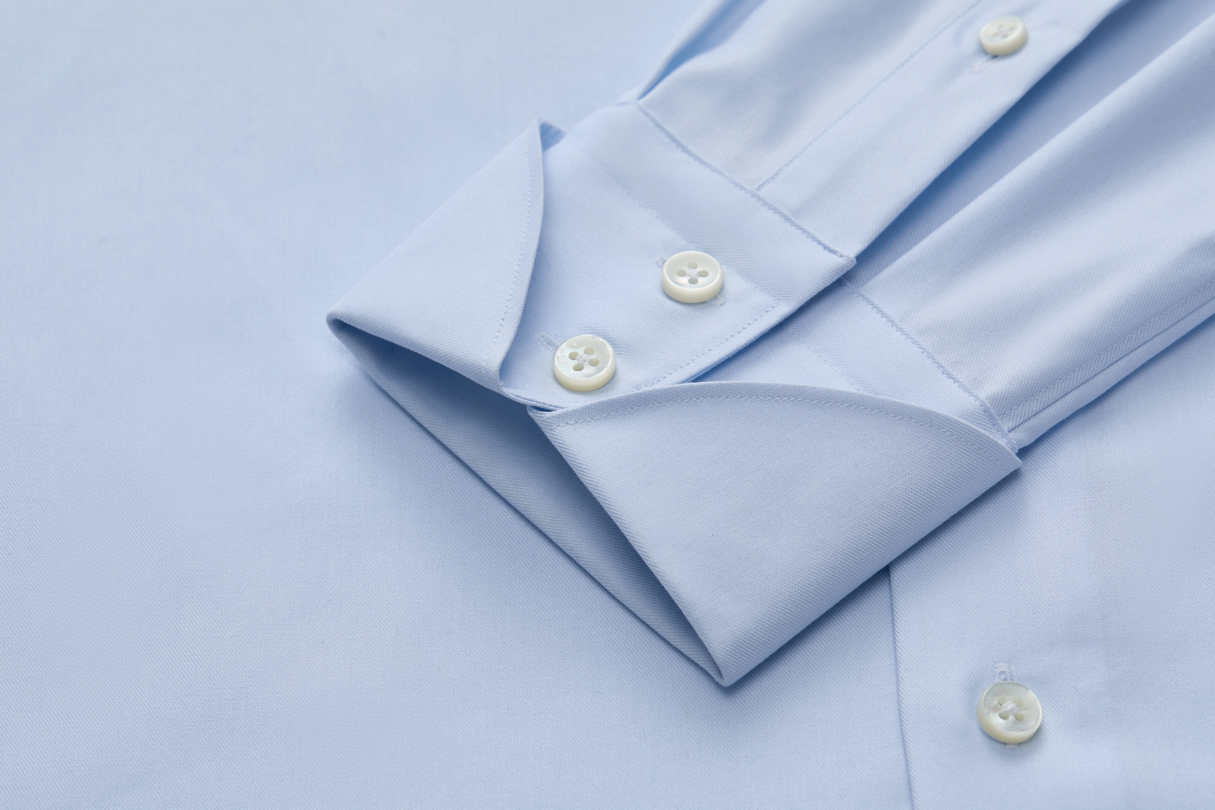 Close-up of two-button turnback cocktail cuff on The Adrien shirt